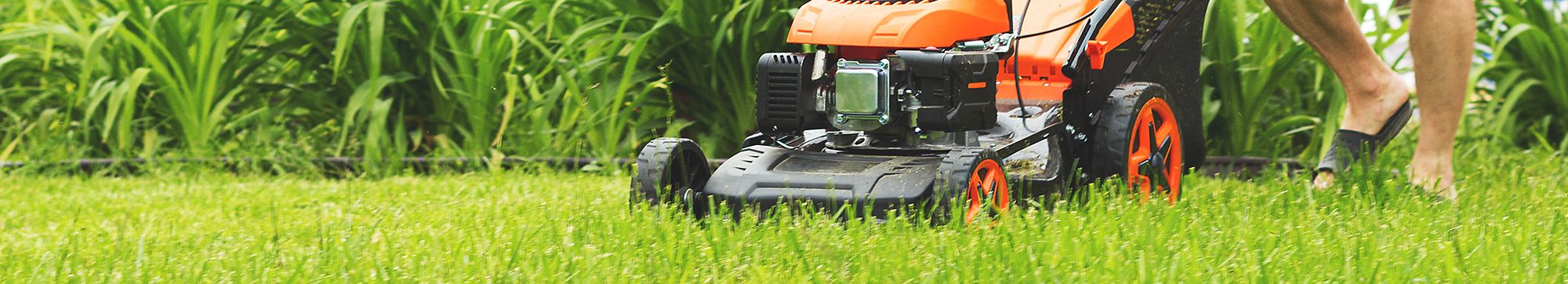 Man mowing his lawn.